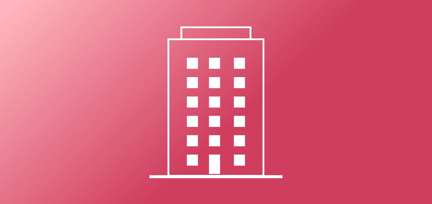 A simple white line drawing shows a tall, multi-story building on a pink background. The many stacked windows suggest it's a big building with lots of offices, like the headquarters of a large company or enterprise.